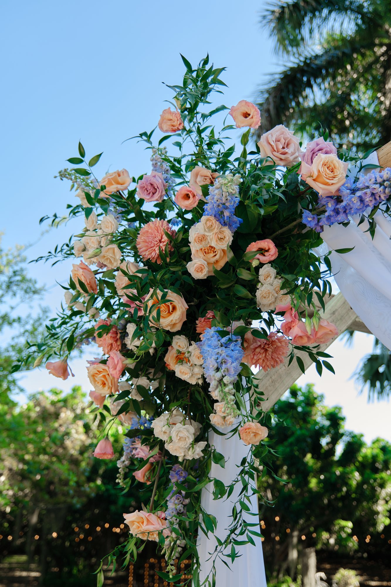 Close view of peach, blush, lavender, and blue wedding flowers